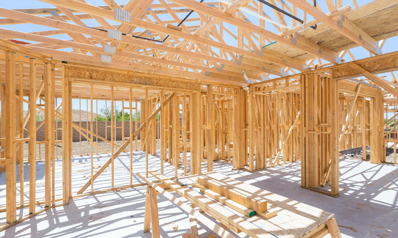 Image of a new single family home being framed
